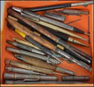 A hallmarked silver propelling pencil by Yard O Led together with a yellow metal metamorphic