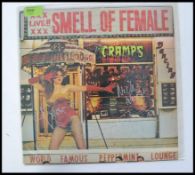 The Cramps - The Cramps long play vinyl record live album ' Smell Of Female ' being fully signed