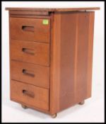A single retro teak pedestal office filing / chest of drawers, having four straight drawers,