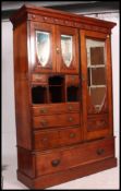 A Victorian mahogany arts & crafts compactum wardrobe.