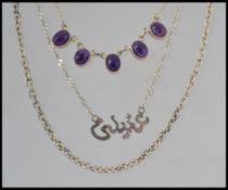 A collection of 3 silver necklace chains