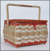 A retro mid century sewing box, having t