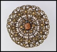 A 1940's Art Deco large circular gold to