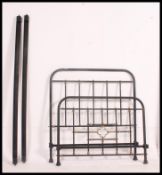 An early 20th century reconditioned French cast metal and brass bed,