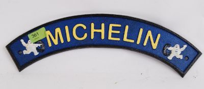 A reproduction cast iron curved advertis