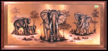 A retro 1970's wall mounted copper repou