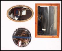 A bevelled edge art deco mirror along wi