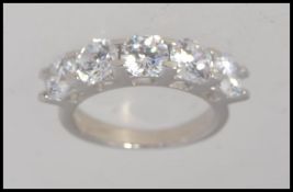 A contemporary ladies silver having inse