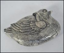 A silver plated vesta case in the form o