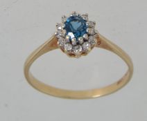 A hallmarked 9ct gold ring with central