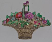 A vintage white metal brooch pin in the