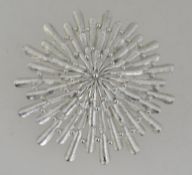 A vintage 1950s large white metal flower