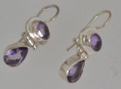 A pair of 925 articulating drop earring