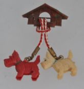 An early vintage celluloid brooch in the