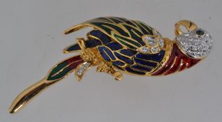 A vintage yellow metal figural brooch in