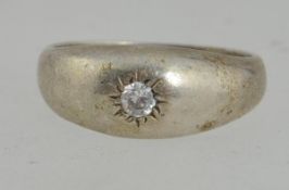 A 925 silver ring with a CZ in a star cu
