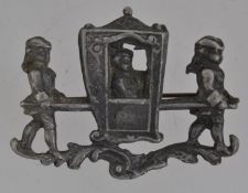 A 1920s pewter metal brooch in the form
