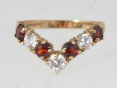 A hallmarked Birmingham 9ct gold garnet