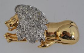 A vintage white and yellow metal figural