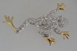 A vintage white and yellow metal figural