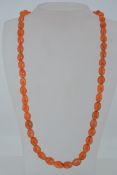 A vintage carnelian bead necklace with h