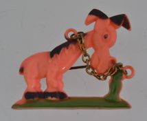 An early vintage celluloid brooch in the