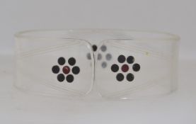 A vintage lucite bangle bracelet with ge
