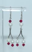 A pair of 925 silver earrings with pearl