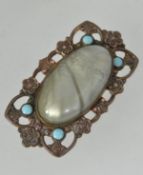 A vintage yellow metal Art Nouveau style