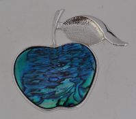 A vintage white metal figural brooch in