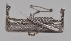 A vintage tests silver filigree brooch