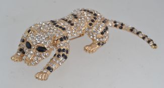 A huge vintage yellow metal figural broo