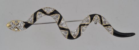 A vintage white and yellow metal figural