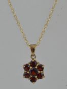 A hallmarked 9ct gold pendant necklace w