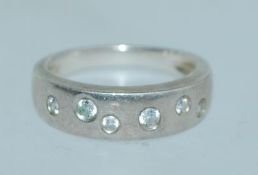 A contemporary 925 silver band ring with