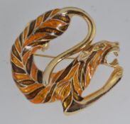 A vintage yellow metal figural brooch pi