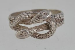 A 925 silver ring with a twin coiled sna