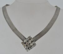 A vintage white metal chocker necklace w