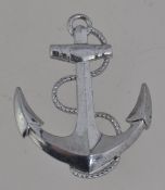 A vintage Art Deco white metal figural b