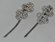 A pair of white metal 1930s Art Deco pa