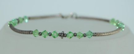 A 925 silver bangle bracelet with silver