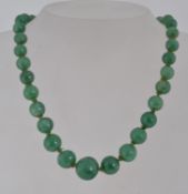 A vintage aventurine knotted bead neckla