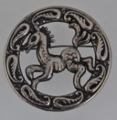 A large vintage white metal brooch pin