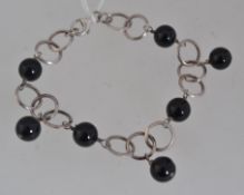 A vintage silver French jet drop bracele