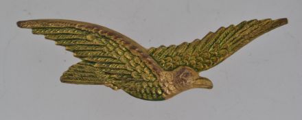 A vintage yellow metal brooch pin in th