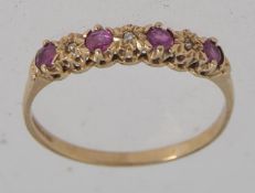 A hallmarked 9ct gold ring set with alte
