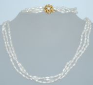 A vintage triple string cultured rice p