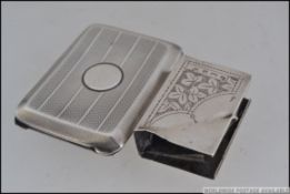 A silver hallmarked engine turned match book holder, having assay marks for Birmingham,
