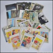 A collection of postcards to include humorous and contemporary 20th century topographical etc