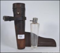 An early 20th century Swaine & Adeney Ltd of London silver hallmarked cut glass campaign - saddle